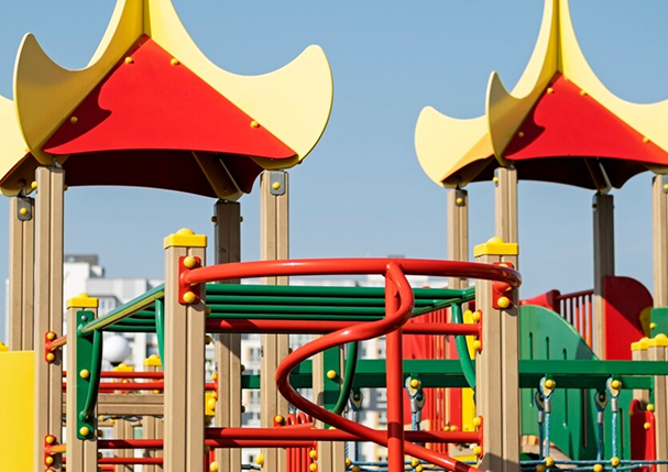 outdoors-colorful-children-playground-background_23-2149587764 1